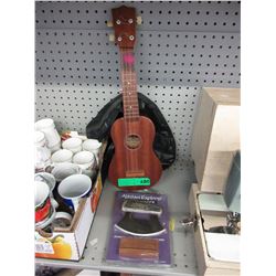 Vintage Raven ukulele and new Alaskan Ulu knife