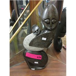 Carved soapstone statue