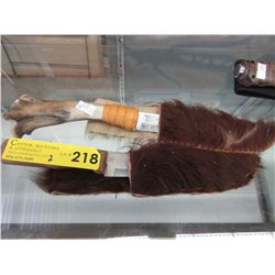 2 Hand made hide sheaths with knives