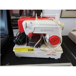 Vintage Singer toy sewing machine with case