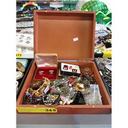 Wood box of costume jewelry