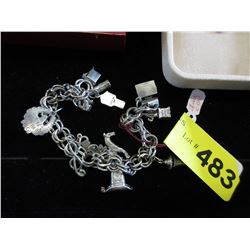 Sterling Silver charm bracelet with 10 charms