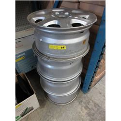 4 Aluminum tire rims - used