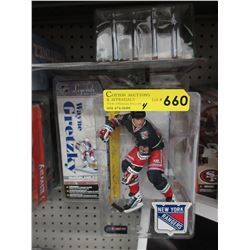 4 McFarlane collectible sport figurines
