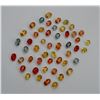 Image 1 : Fancy Multi Color Oval Sapphire 10 cts plus