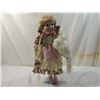 Image 1 : PORCELAIN FLORAL DRESS DOLL