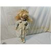 Image 1 : PORCELAIN DOLL IN BLUE DRESS