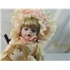 Image 2 : VINTAGE PORCELAIN DOLL WITH HIGHCHAIR