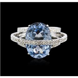 14KT White Gold 9.75ct Blue Topaz and Diamond Ring