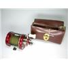 Image 1 : An Abu Ambassadeur No. 6000 multiplying reel in brown leather case with oil bottle and spares...