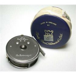 A Hardy Featherweight trout fly reel, 23/4", in blue and grey Hardy zip case...