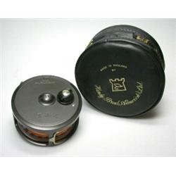 A Hardy Husky wide spool fly reel, 31/4", in black Hardy zip case...