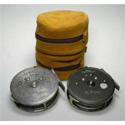 Two Hardy Princess trout fly reels, 33/8", (one lacking all finish) together in tan suede zip case..