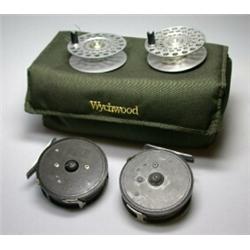 A Hardy LRH Lightweight trout fly reel, 3", another Hardy LRH Lightweight reel, 3" and two spare sp.