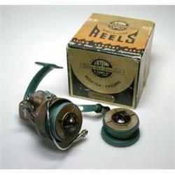 A J. W. Young Ambidex fixed spool reel, turquoise and grey, with spare spool, in original Young car.