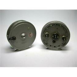 A J. W. Young Rapidex trotting reel, grey finish, 4"; together with another similar older reel (2)..