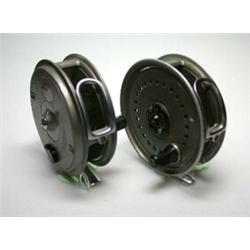 A J. W. Young Beaudex wide drum fly reel, grey finish, chrome foot, 33/8"; another similar with bla.