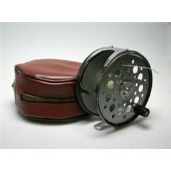 A Farlow's Cobra wide drum trout fly reel, 31/2", in brown zip case...