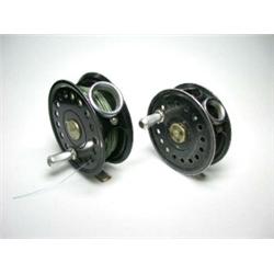 A Milward Flycraft salmon fly reel, black finish, 35/8"; and another Flycraft reel, 33/8" (2)...