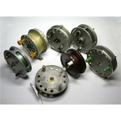 Assorted reels including: a J. W. Young Trudex trotting reel, 4"; a J. W. Young Freedex multiplier,.