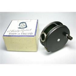 A Hardy Perfect trout reel, narrow drum, on ribbed brass foot, 37/8", in Hardy blue and cream card..