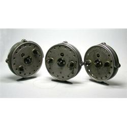 Three J. W. Young Trudex trotting reels, grey finish, 37/8" (3)...