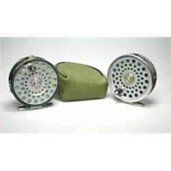 A Hardy Marquis No. 7 trout fly reel, 31/4" in green zip case, and a Hardy LRH lightweight trout fl.