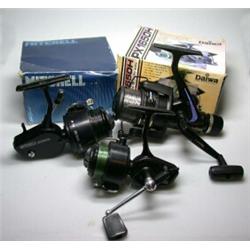 A Mitchell 206S fixed spool reel, with spare spool, boxed; a Mitchell 204S fixed spool reel and a D.