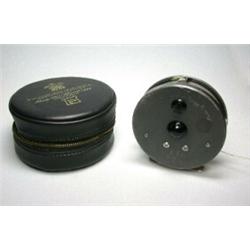 A Hardy Marquis #8/9 trout reel in black Hardy zip case...