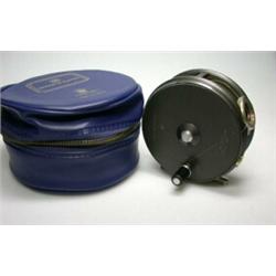 A Hardy Perfect trout reel, 33/8" in blue Hardy zip case...