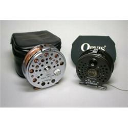 An Orvis Battenkill 5/6, 3 trout fly reel in Orvis pouch; and a  Shakespeare International 2853 tro.