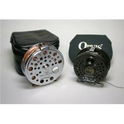 An Orvis Battenkill 5/6, 3" trout fly reel in Orvis pouch; and a Shakespeare International 2853 tro.