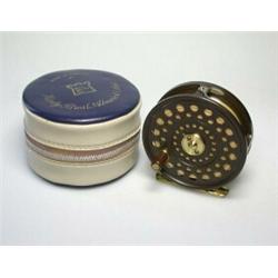 A Hardy LRH Lightweight trout fly reel, brown and brass finish, 31/8", in blue and grey Hardy zip c.