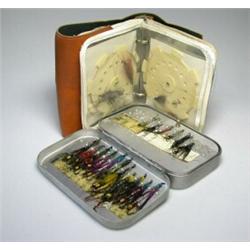 A Wheatley alloy fly box with salmon flies, and a wallet containing salmon casts (2)...