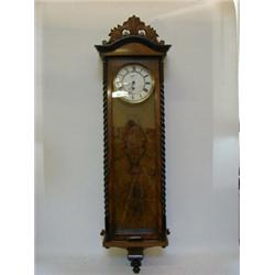 A VIENNA WALL TIMEPIECE, early 20th Century, figured walnut case, 16cm enamel Roman dial, (with p...
