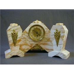 AN ART DECO STYLE TIMEPIECE GARNITURE, angular pink veined marble with brass mounts, (with key), ...