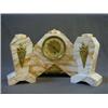 Image 1 : AN ART DECO STYLE TIMEPIECE GARNITURE, angular pink veined marble with brass mounts, (with key), ...