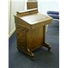 Image 1 : A FIGURED WALNUT DAVENPORT, mid Victorian, stringing inlay, four drawers to the right side, on ca...