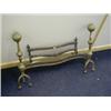 Image 1 : A BRASS FIRE GRATE, 19th Century, (front section only), fluted andirons on triple feet, serpentin...