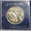 Image 1 : 24. 1974 Seychelles Ten Rupees (Elizabeth II and Sea turtle design) Encased. BU. Weighs 28.36 grams.