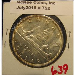 752. 1963 Canada Silver Dollar. Gem BU.