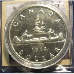 814. 1959 Canada .800 Fine Silver Dollar. MS 63 Prooflike. Ex. Christopher's, Des Moines, Ia.