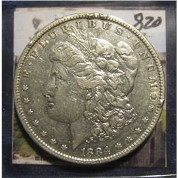 820. 1884 P U.S. Morgan Silver Dollar. EF 40. Rim ticks.