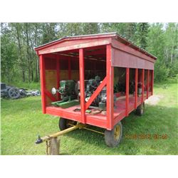 Four wheel trailer w/ deck one wall and roof
