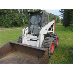 Bob cat model 975 , 7 ft bucket very good tires