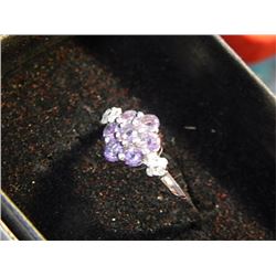 RING -.75CT AMETHYST AND 8 DIAMONDS - SET IN STERLING SILVER - RETAIL APPROX... $550
