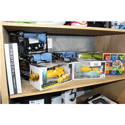 GROUP LOT OF 9 ASSORTED RADIO CONTROLLED TOYS; YELLOW SUBMARINE, ZAMBONI, HELICOPTER, ETC