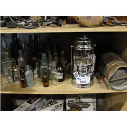 SHELF LOT OF ASSORTED COLLECTABLES; VINTAGE GLASS BOTTLES, COPPER FIRE EXTINGUISHER, CHROME PLATED