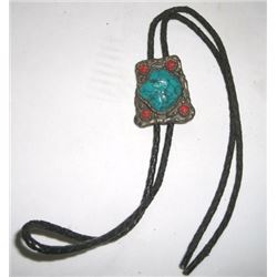VERY UNIQUE VINTAGE MENS BOLO-TIE STAMPED WITH AN INDIAN KACHINA DOLL-BOLO-TIE HAS FAUX TURQUIOSE &
