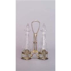 WÜRTTEMBERGISCHE METALLWARENFABRIK, GEISLINGEN Menage, Zinn, versilbert, farbloses Glas. Gl...